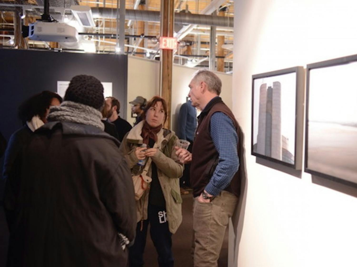 Last Friday's opening reception for "Looking North," now on display in Smith Warehouse Bay 11.