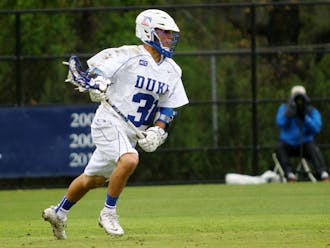 Senior Jordan Wolf tallied six goals and added a pair of assists as Duke routed Rutgers 17-8 on Senior Day at Koskinen Stadium.