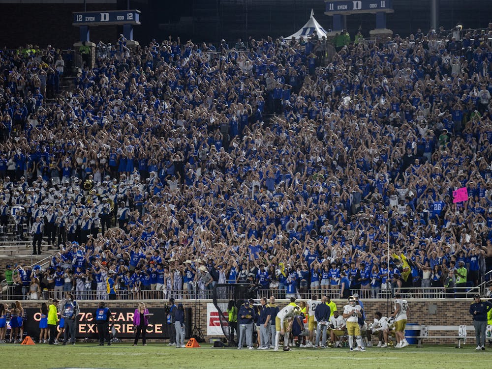 The Duke student section cheers during the Blue Devils' loss to Notre Dame.