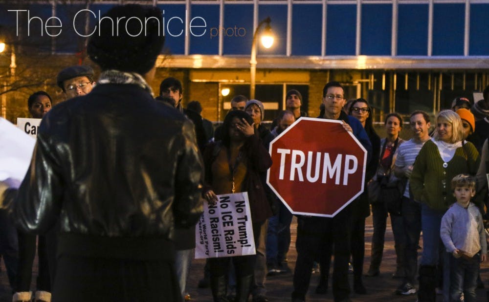 <p>Durham residents gathered to protest President Donald Trump's inauguration Friday evening.&nbsp;</p>