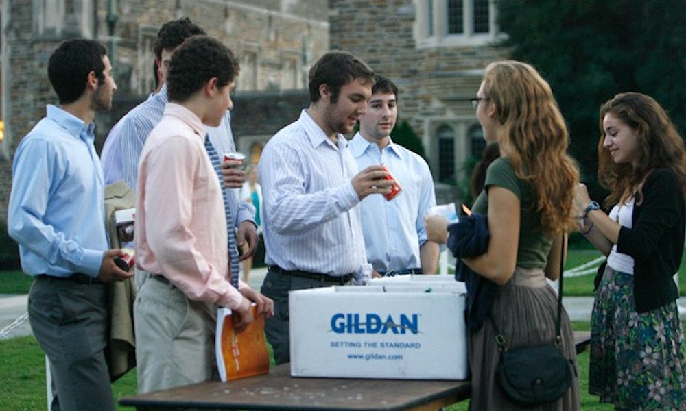 Members of the greek community gathered outside the Chapel after the convocation ceremony Tuesday night.