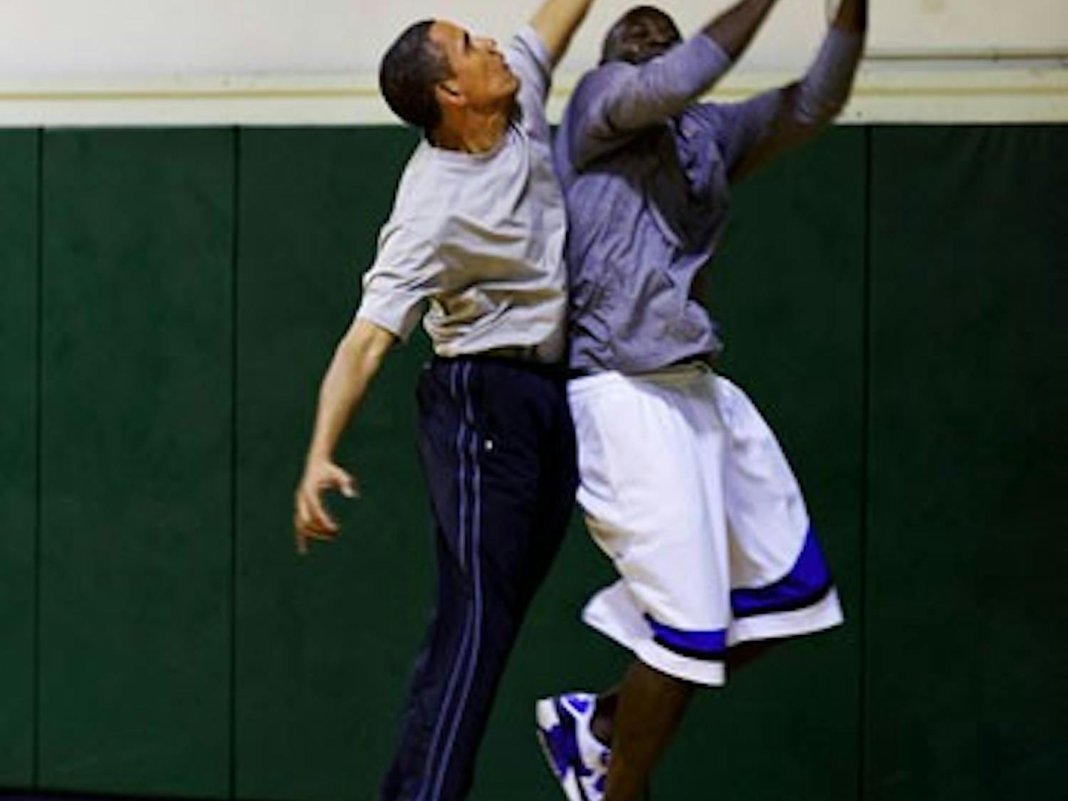 President Barack Obama plays basketball with personal aide Reggie Love at St. Bartholomew (St. Bart's) Church in New York, N.Y. on Sept. 23, 2009.   (Official White House photo by Pete Souza)This official White House photograph is being made available only for publication by news organizations and/or for personal use printing by the subject(s) of the photograph. The photograph may not be manipulated in any way and may not be used in commercial or political materials, advertisements, emails, products, promotions that in any way suggests approval or endorsement of the President, the First Family, or the White House. 