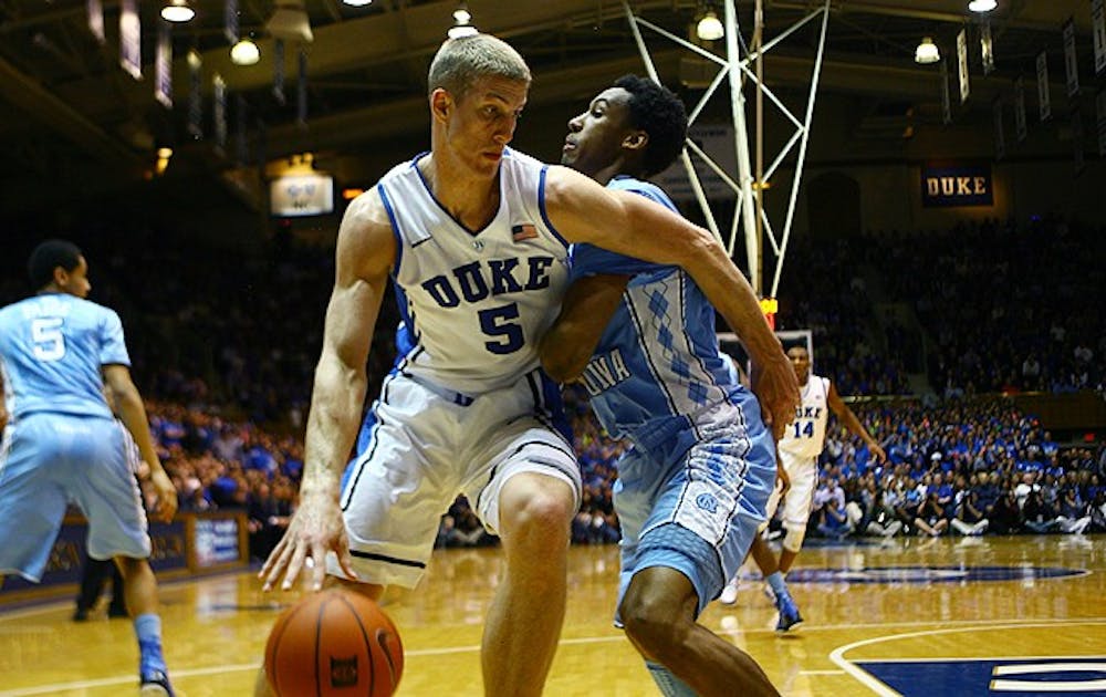 After turning it over four times in the first half, Mason Plumlee did not cough it up once in the second period and battled through foul trouble to record 18 points and 11 rebounds.