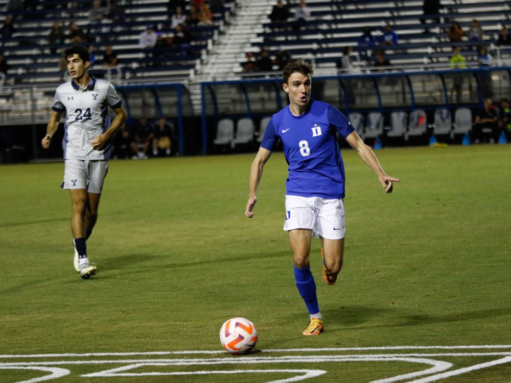 Peter Stroud dribbles forward in Duke's draw with Yale in 2022.