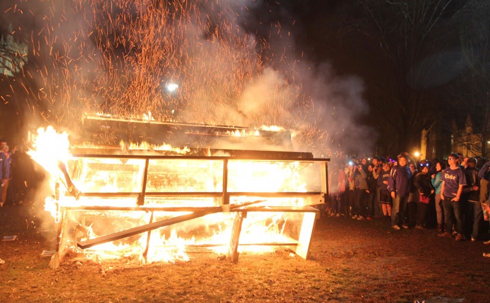 Duke students celebrate a win by burning benches on the Main West Quadrangle.