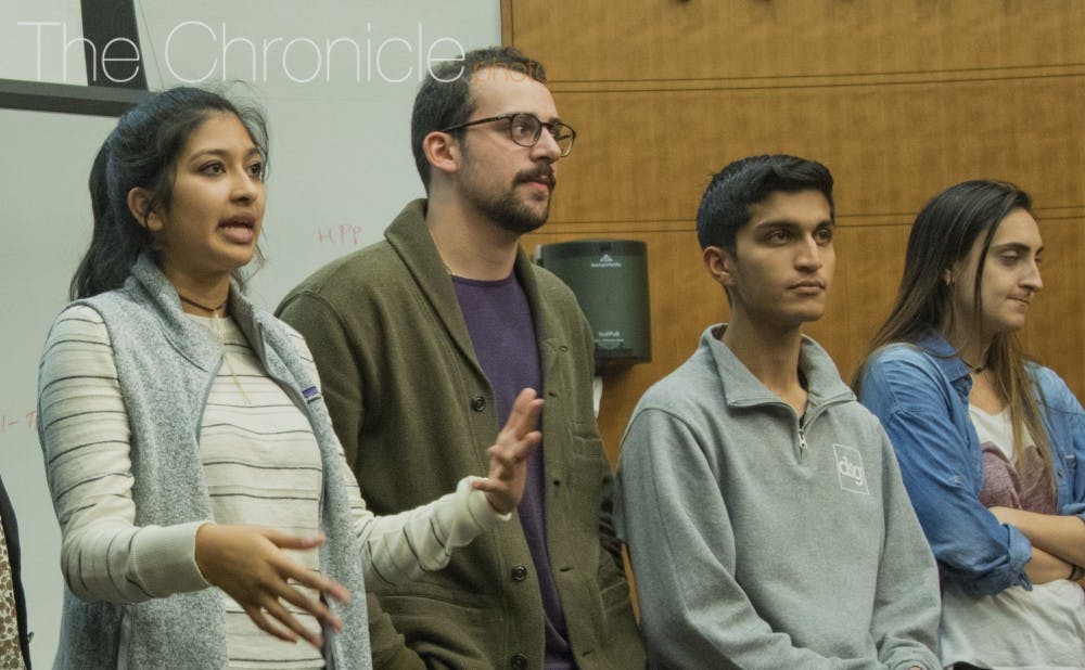 Chief of Staff Kushal Kadakia (center right) said DSG wants to form closer relationships with student groups.