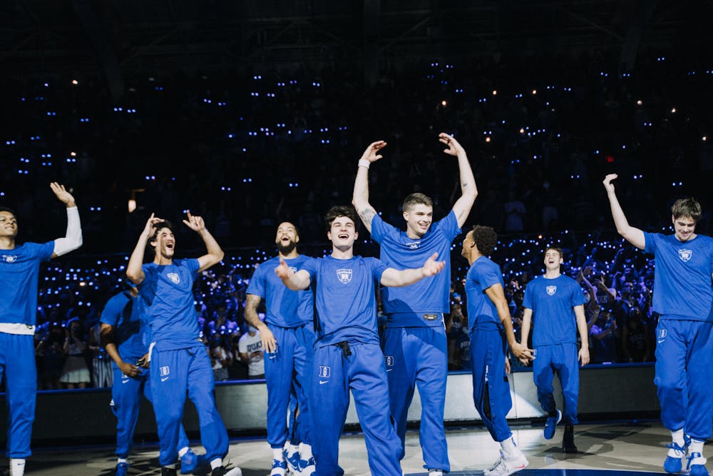 The Blue Devils appeared out of the middle of the student section when they first stepped onto Coach K Court Friday evening.