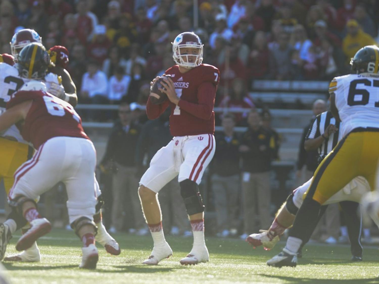 Quarterback Nate Sudfeld looks to pass during the game against Iowa on Saturday at Memorial Stadium. The Hoosiers lost, 27-35.