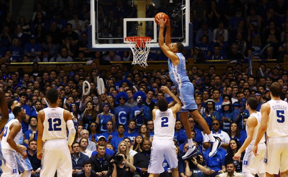 Tar Heel forward Brice Johnson and his teammates dominated Duke inside for the second time this season, rebounding 10 of their 19 first-half misses.