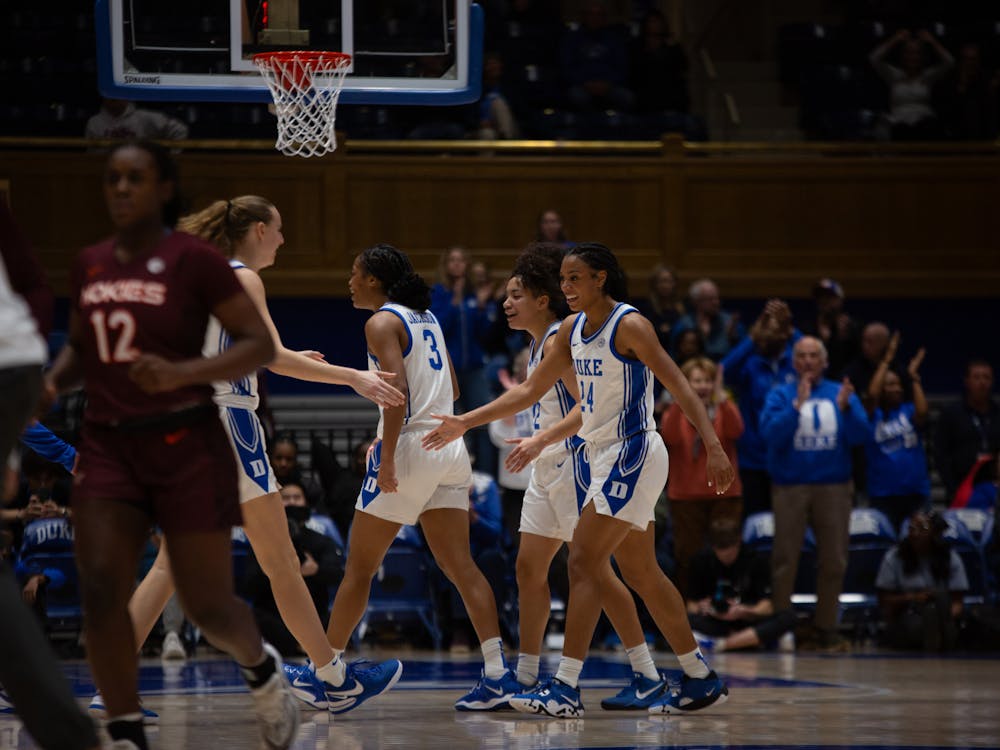 From left: Camilla Emsbo, Ashlon Jackson, Taina Mair and Reigan Richardson celebrate during Duke's suffocating win against Virginia Tech.