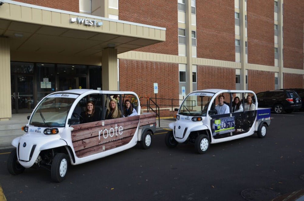<p>Seniors Cameron Winders and JD Herrman are bringing a program to campus that provides free rides using electric vehicles.</p>