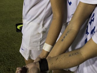 Women's soccer players mark an X on their arm for each shutout.