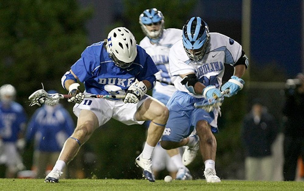 The No. 17 Duke men's lacrosse team upset No. 6 UNC 11-8 at Fetzer Field in Chapel Hill. Junior Brendan Fowler won 17-of-23 faceoffs while Jordan Wolf added three goals and an assist.