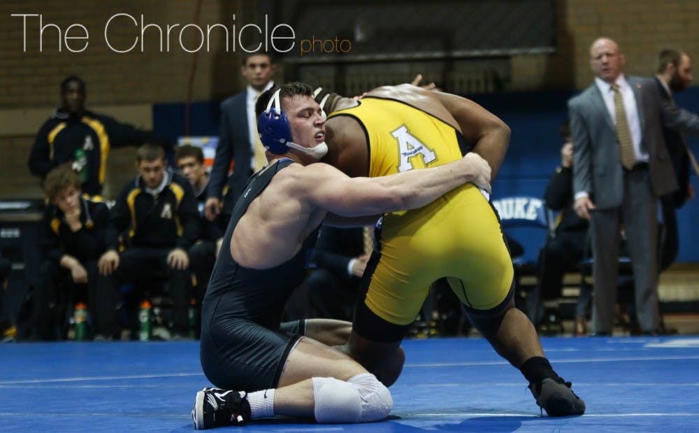 Jacob Kasper went 3-0 Friday, but the Blue Devils came up short three times as a team.