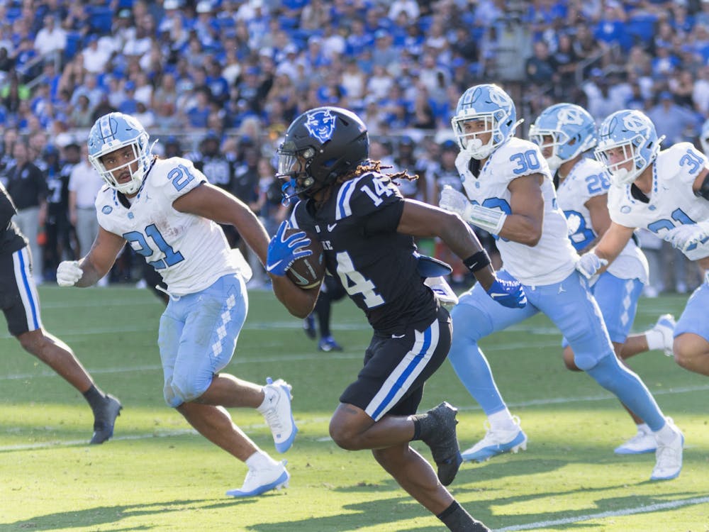 Wide receiver Que'Sean Brown returns a punt for the Blue Devils.