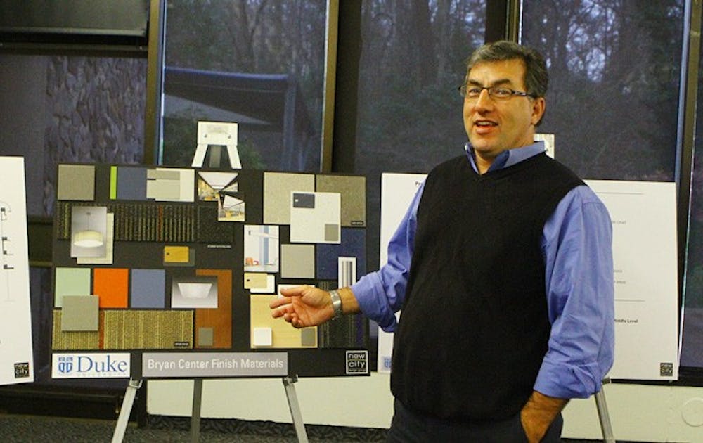 Ted Van Dyk, Trinity ’83 and principal and founder of the architecture firm, Raleigh-based New City Design Group, displayed detailed floor plans of the Bryan Center renovations at an open house Tuesday afternoon.