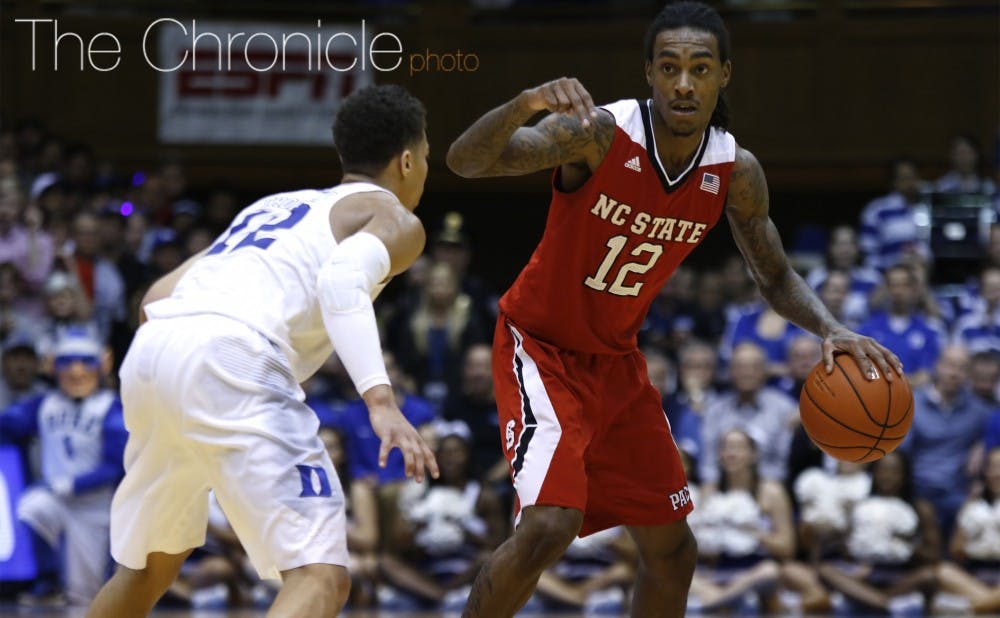 <p>Point guard Anthony "Cat" Barber scored 26 points in the Blue Devils' most recent meeting with the Wolfpack Feb. 6 in Durham.</p>