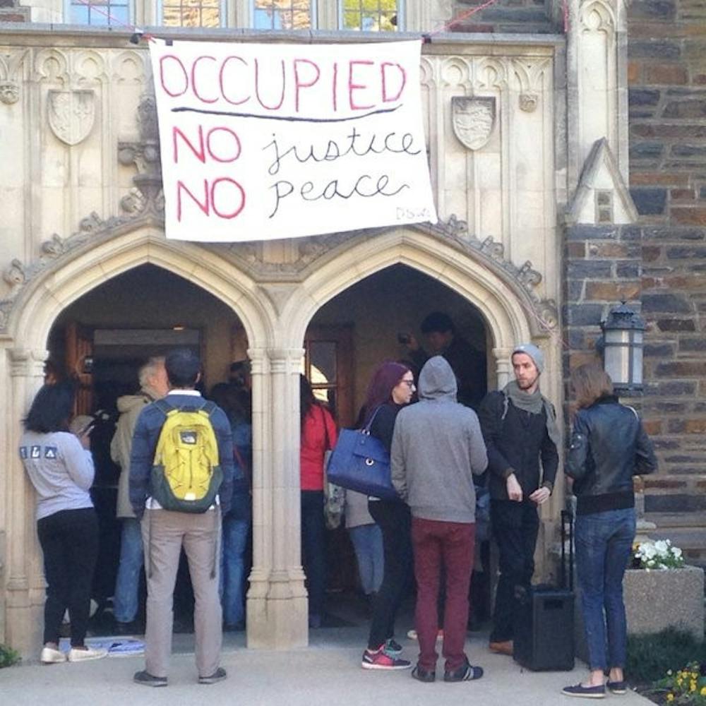 Students and faculty began gathering in front of the Allen Building early Sunday morning.&nbsp;