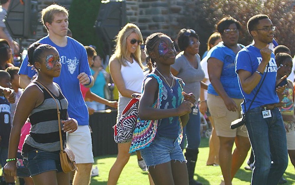 Students boogie on the Quad during the pre-football game cookout Saturday.