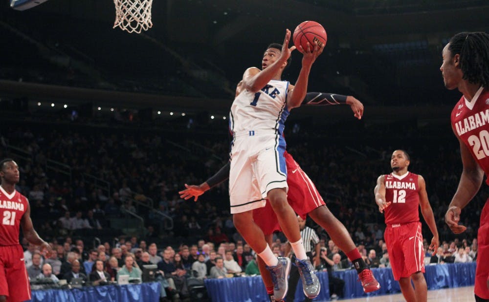 Jabari Parker tied his career-high with 27 points as the Blue Devils knocked off Alabama 74-64 at Madison Square Garden.