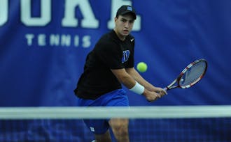 Sophomore captain Nicolas Alvarez made quick work of Elon's&nbsp;Felipe Sarrasague on the top singles court as the Blue Devils cruised to a 6-1 victory Friday.
