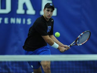 Sophomore captain Nicolas Alvarez made quick work of Elon's&nbsp;Felipe Sarrasague on the top singles court as the Blue Devils cruised to a 6-1 victory Friday.
