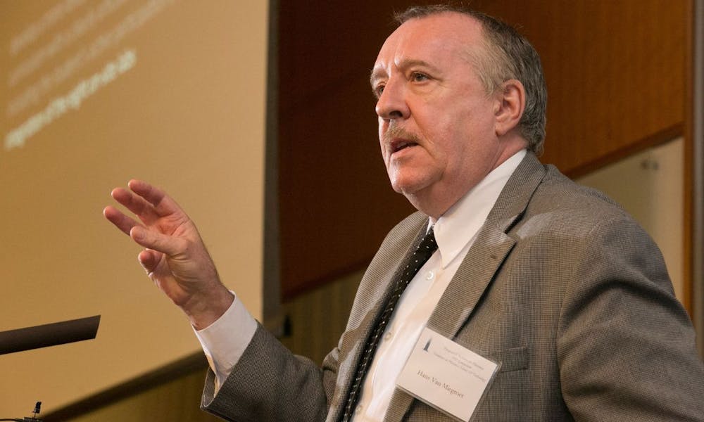 Hans Van Miegroet speaking at a 2014 symposium at Duke's Fitzpatrick Center on "Frontiers in Photonics Science and Technology."