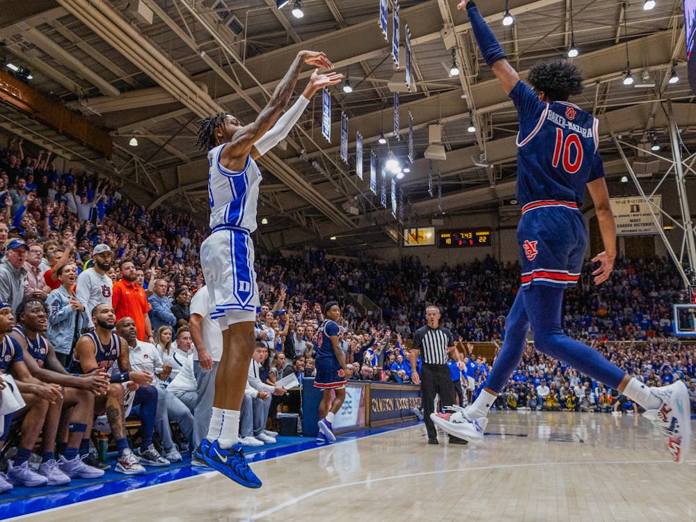 Isaiah Evans hit six first-half triples for the Blue Devils. 