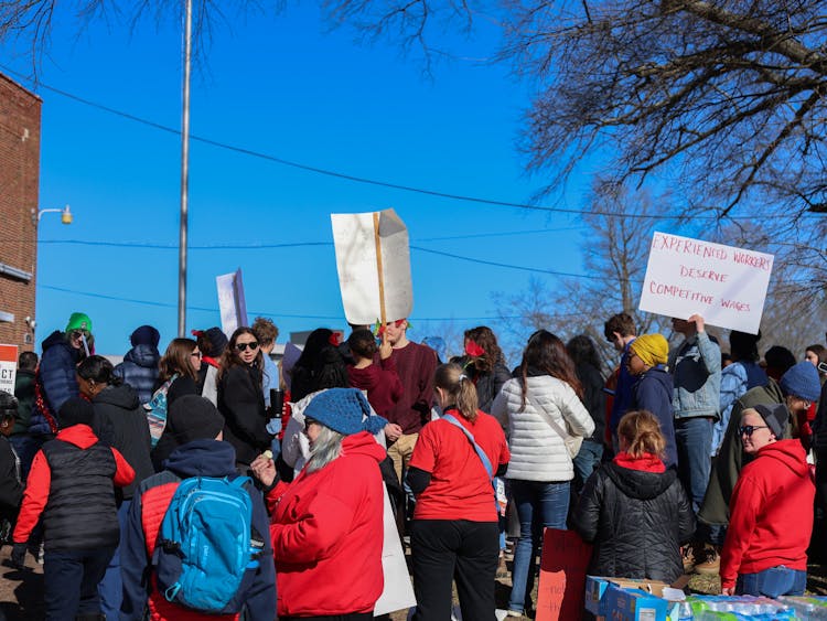 A crowd of people gathered at a Feb. 5 Durham Association of Educators protest organized in support of DPS classified staff, who are facing pay cuts after the district accidentally overpaid them due to an accounting error.&nbsp;
