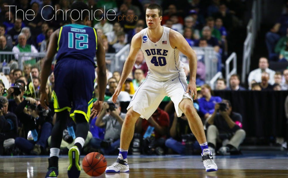 Graduate student Marshall Plumlee has averaged 8.4 points and 8.7 rebounds per game for Duke this season, a marked increase from his production in previous years.