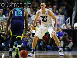Graduate student Marshall Plumlee has averaged 8.4 points and 8.7 rebounds per game for Duke this season, a marked increase from his production in previous years.