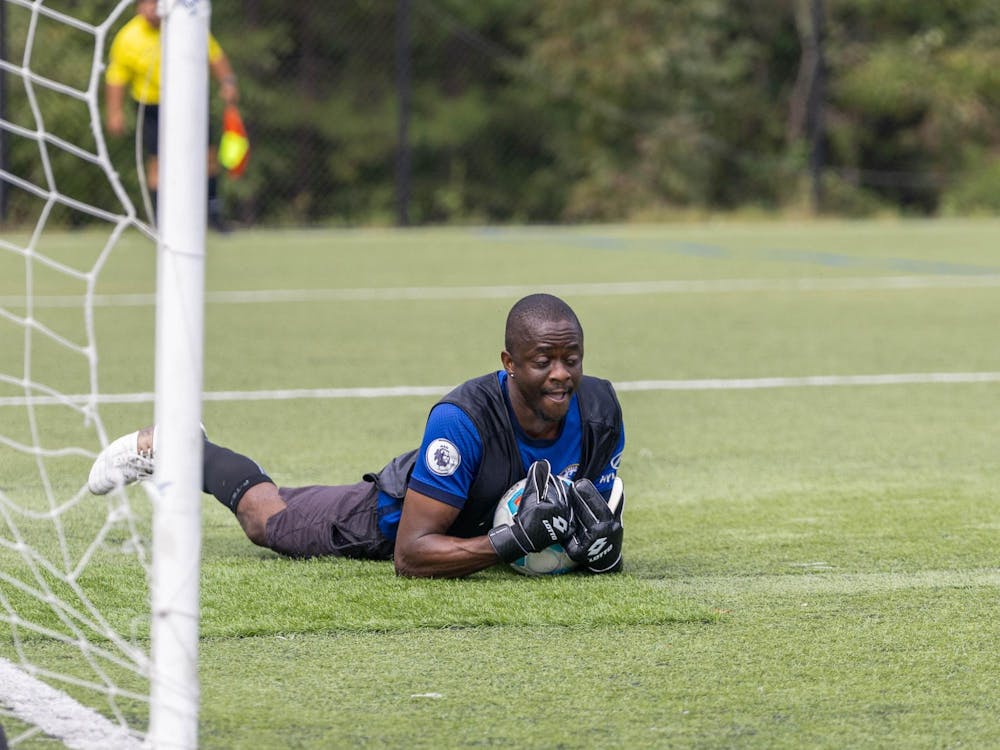 <p>Taofik Oyekunle, captain of the RDU Stars, stepped up to play goalie for the Welcoming Week soccer tournament.</p>