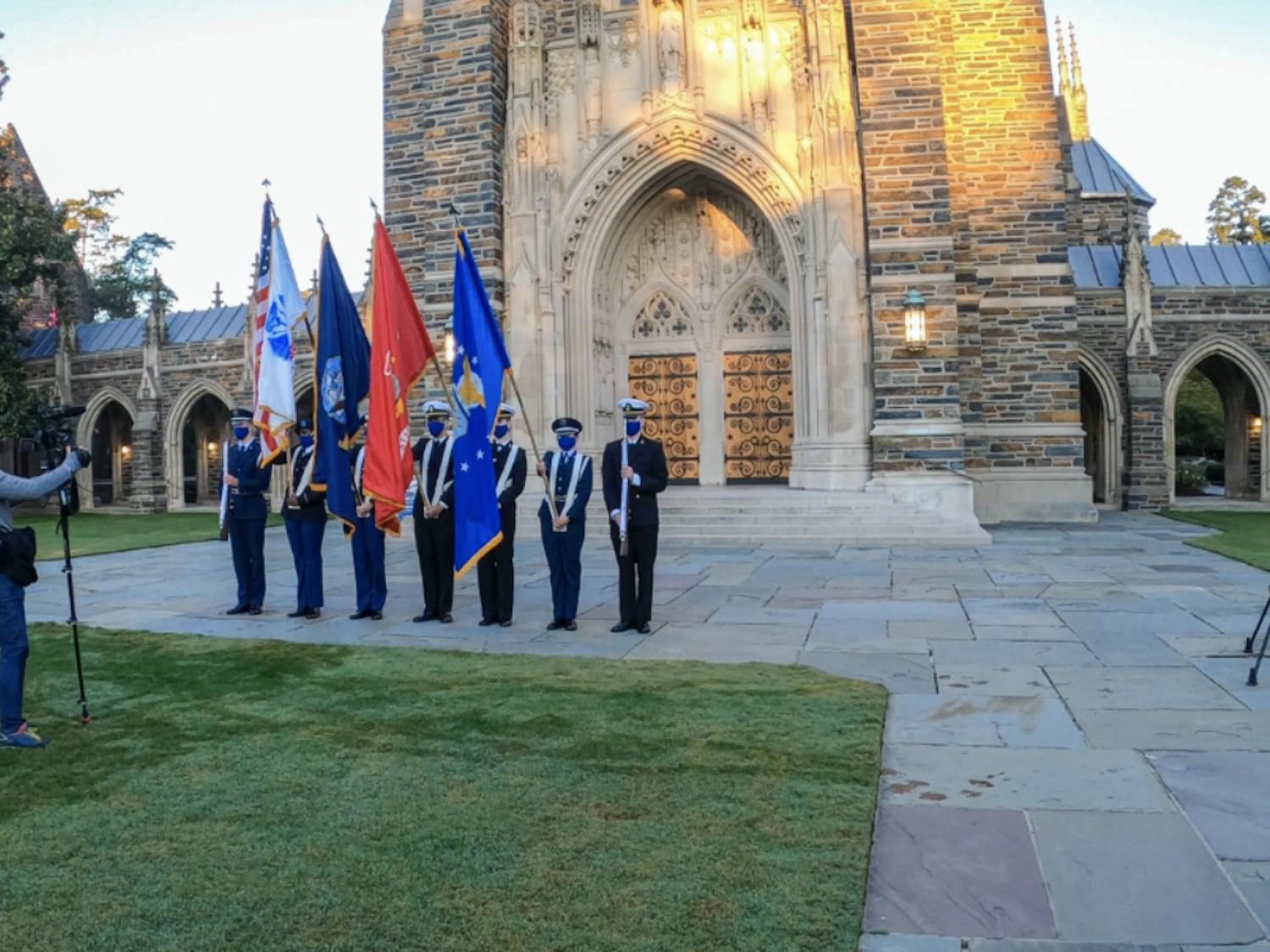 The DBS team taping Veterans Day ceremony in front of the chapel.