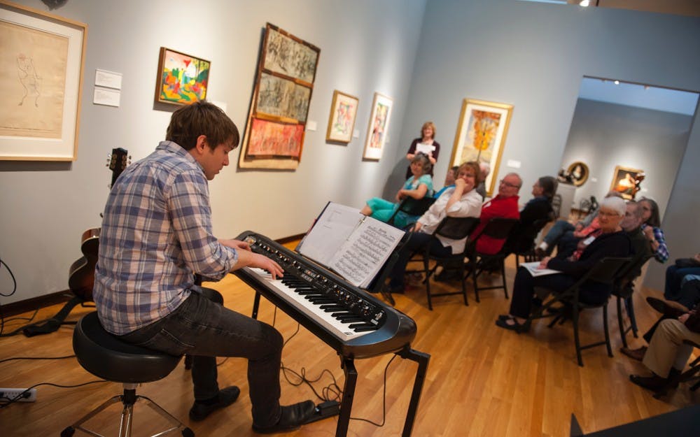 Mark Wells performs in the Nasher galleries for the Reflections program. 