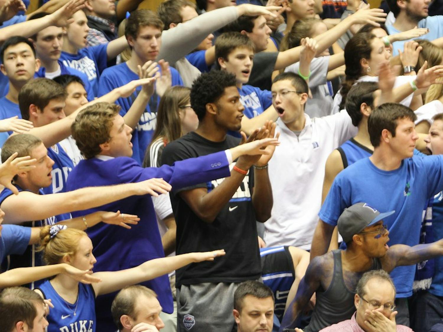 Duke signee Justise Winslow spent the second half of Monday's win against Virginia watching the game with the Cameron Crazies.