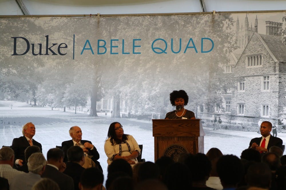 <p>Black Student Alliance President Tiana Horn, a senior,&nbsp;and President Richard Brodhead helped unveil Abele Quad,&nbsp;named after the black architect who designed the University's West Campus.&nbsp;</p>