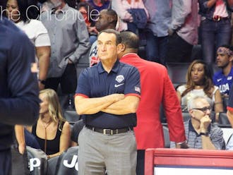 Mike Krzyzewski became the first national team head coach ever to win three gold medals in his final game with Team USA Sunday against Serbia.