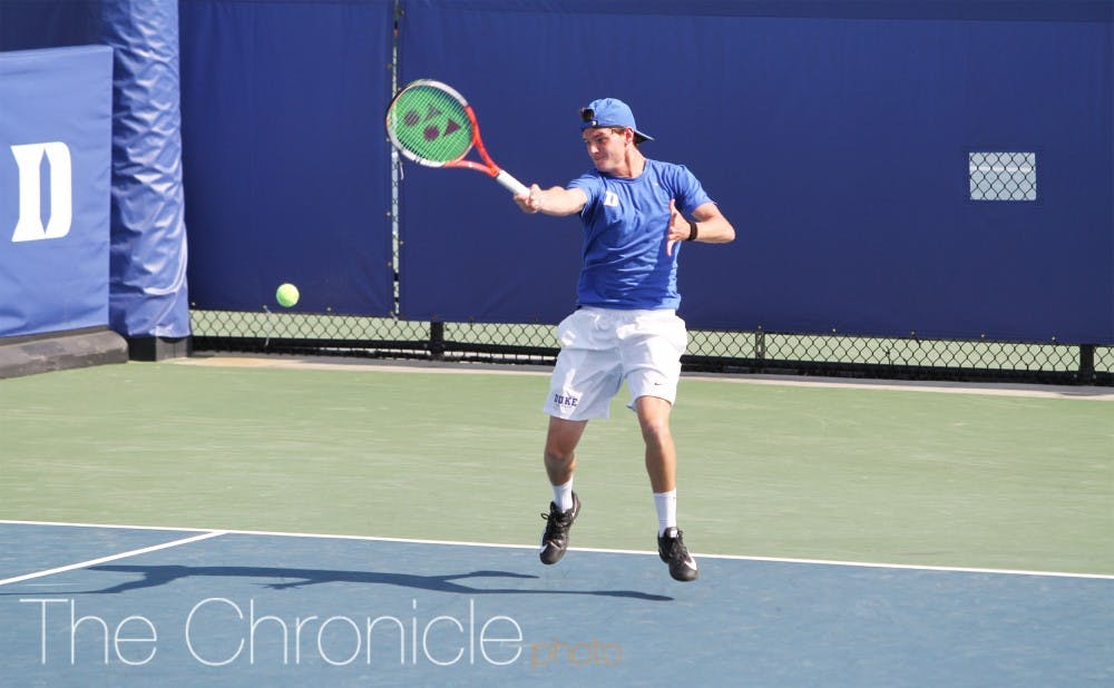 <p>Freshman Spencer Furman won six straight games to claim a dramatic first set against No. 64 Piotr Lomacki, who retired after the set to hand Furman the match.</p>