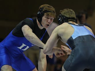 No. 7 Conner Hartmann took down North Carolina's Chip Ness 6-0 in Wednesday's 16-15 loss.