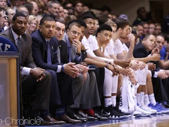 Associate head coach Jon Scheyer (fourth from left) touched on a variety of topics Friday morning.