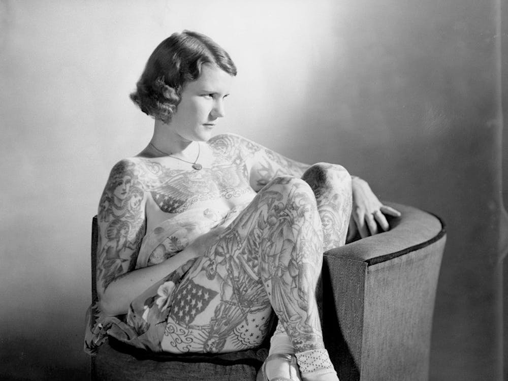 Women such as Betty Broadbent (above) were put on display in circuses and sideshows as “The Tattooed Lady” in the early 1900s.