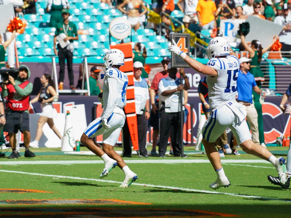 Jordan Moore scores in the end zone against Miami. 