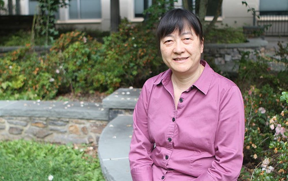Biology professor Xinnin Dong was honored recently for her work in plant immunology.