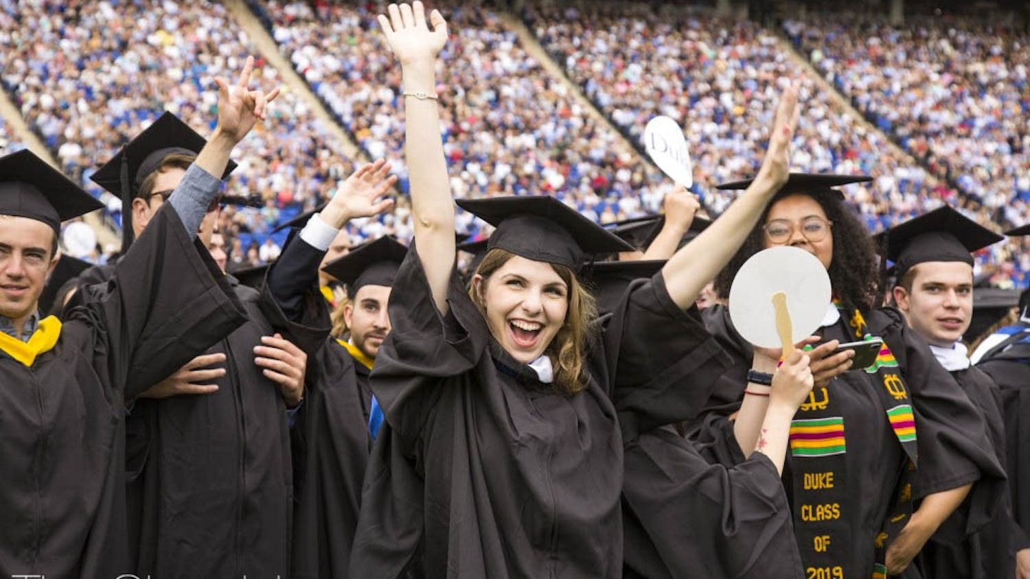 Students celebrate at Duke's commencement ceremony in 2019.