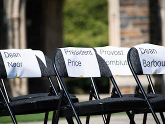 The Duke Graduate Students Union set out chairs representing administrators who were invited to their Fair Contract Sept. 15, 2022 rally and did not attend. 