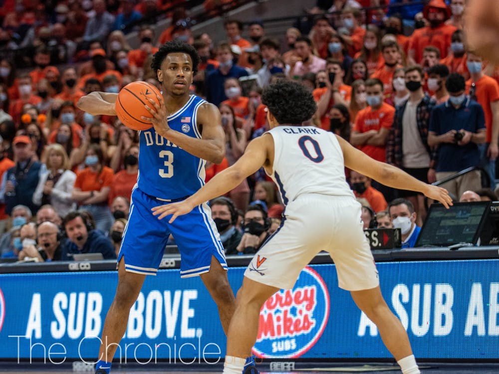 Virginia guard Kihei Clark knocked down six threes in the first half. 