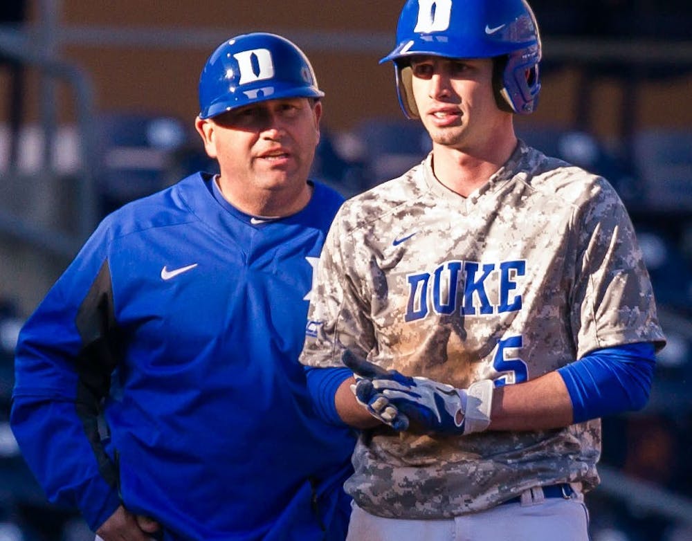 Blue Devil hitting coach Jason Stein (left) has made sure to use all available data to his advantage.