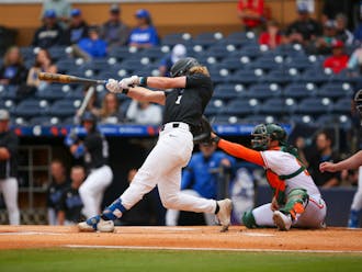 Sophomore Alex Mooney swings during Duke's ACC tournament matchup against Miami.