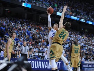 Tyus Jones and the Blue Devils rebounded from last season's ACC tournament loss to the Fighting Irish by hanging a national championship banner in Cameron Indoor Stadium.