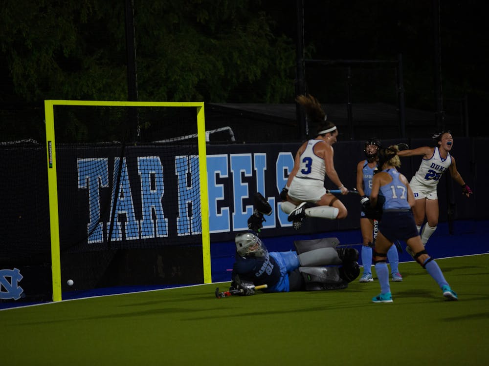 Duke players celebrate a goal during the team's Friday loss to North Carolina.
